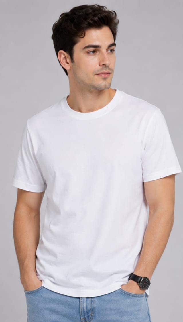 A men's plain white crew-neck worn with jeans